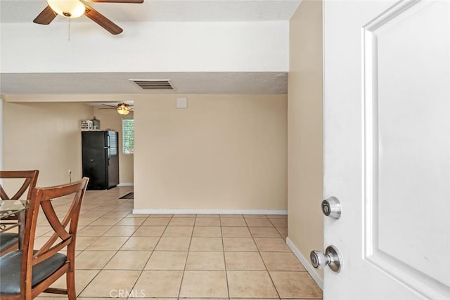 5915 Weedpatch, Bakersfield, CA 93307 - spare room featuring a ceiling fan, light tile patterned floors, and baseboards