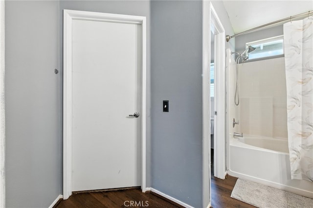 25323 Bayside Pl, Harbor City, CA 90710 - full bath featuring shower / bath combo with shower curtain and wood finished floors
