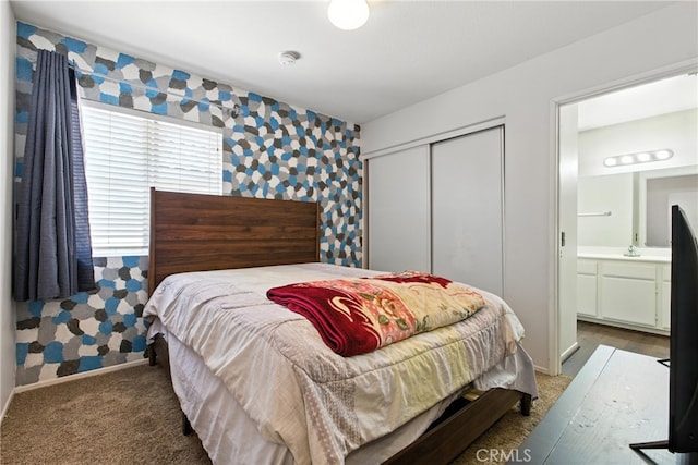 25323 Bayside Pl, Harbor City, CA 90710 - bedroom with wallpapered walls, carpet flooring, a closet, connected bathroom, and an accent wall