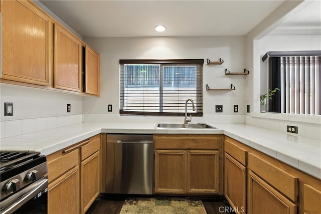 25323 Bayside Pl, Harbor City, CA 90710 - kitchen with appliances with stainless steel finishes, recessed lighting, tile counters, and brown cabinets
