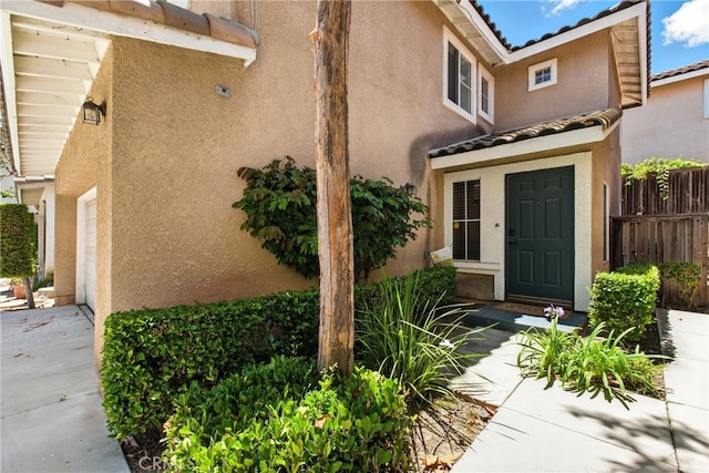 25323 Bayside Pl, Harbor City, CA 90710 - view of property exterior with stucco siding and a tiled roof