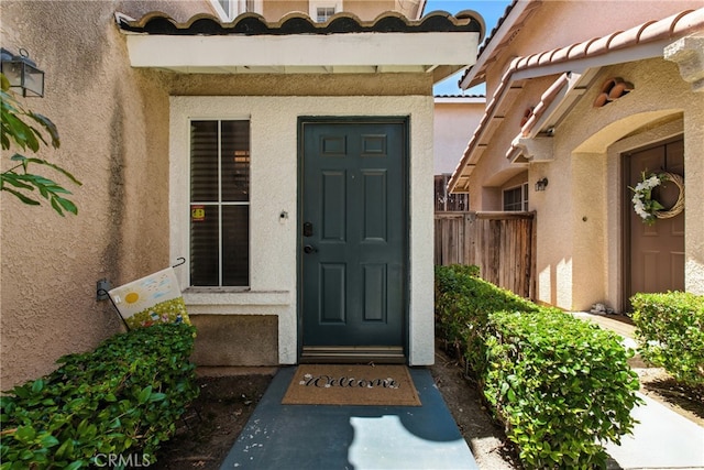 25323 Bayside Pl, Harbor City, CA 90710 - view of exterior entry featuring stucco siding