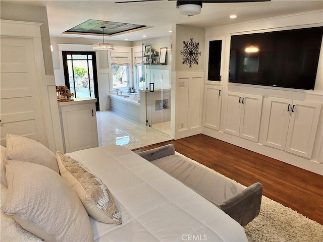 1820 Carfax Ave, Long Beach, CA 90815 - bedroom featuring wood finished floors, wainscoting, a decorative wall, a chandelier, and recessed lighting