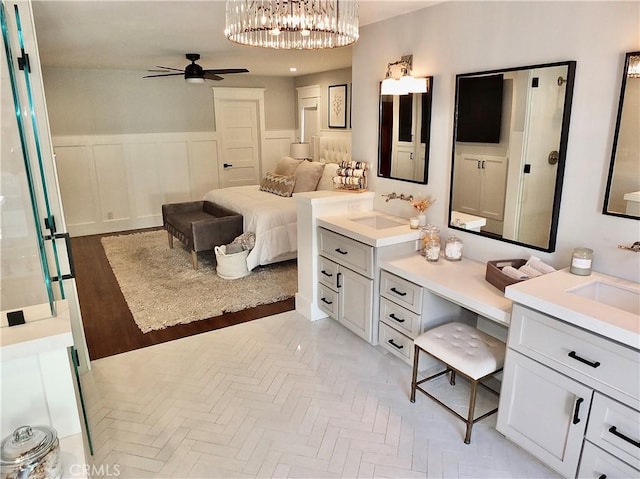 1820 Carfax Ave, Long Beach, CA 90815 - bathroom with ceiling fan, a wainscoted wall, and vanity