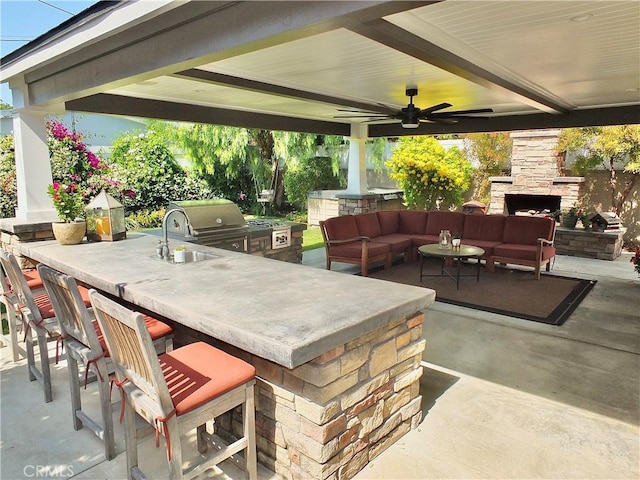 1820 Carfax Ave, Long Beach, CA 90815 - view of patio / terrace with an outdoor living space with a fireplace, a gazebo, an outdoor bar, and a ceiling fan