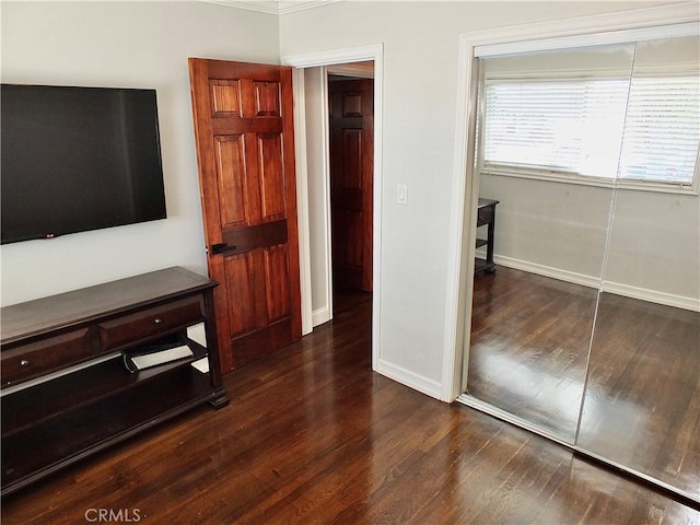 1820 Carfax Ave, Long Beach, CA 90815 - unfurnished bedroom with wood finished floors, baseboards, and a closet