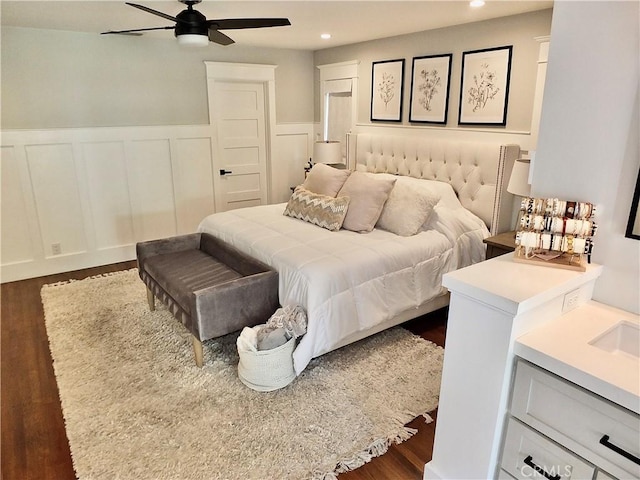 1820 Carfax Ave, Long Beach, CA 90815 - bedroom with recessed lighting, wainscoting, dark wood-type flooring, a decorative wall, and a ceiling fan