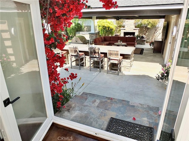 1820 Carfax Ave, Long Beach, CA 90815 - view of patio / terrace featuring an outdoor living space with a fireplace and outdoor dining space