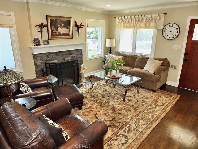 1820 Carfax Ave, Long Beach, CA 90815 - living room with a stone fireplace, wood finished floors, ornamental molding, and baseboards