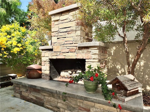 1820 Carfax Ave, Long Beach, CA 90815 - exterior view of an outdoor stone fireplace