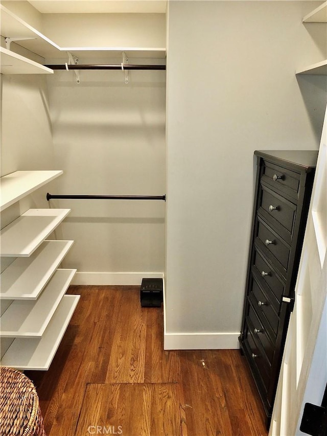 1820 Carfax Ave, Long Beach, CA 90815 - spacious closet with dark wood finished floors
