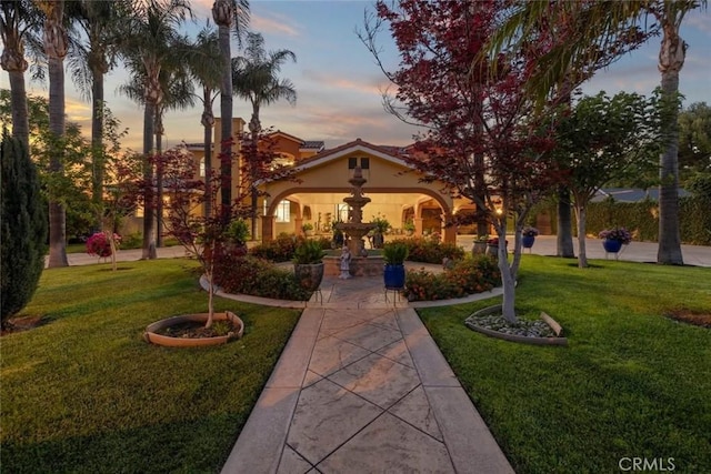 14667 Tyler St, Sylmar, CA 91342 - view of front of house with stucco siding and a yard