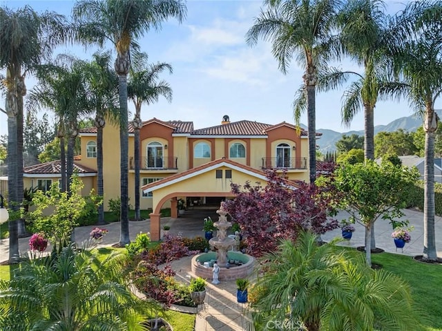 14667 Tyler St, Sylmar, CA 91342 - view of front of home with stucco siding, a mountain view, a chimney, and a tiled roof