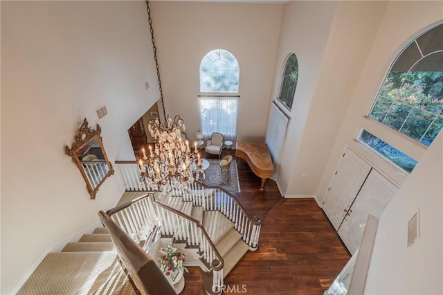 435 S Estate Dr, Orange, CA 92869 - entryway featuring a high ceiling, a chandelier, wood finished floors, stairway, and baseboards