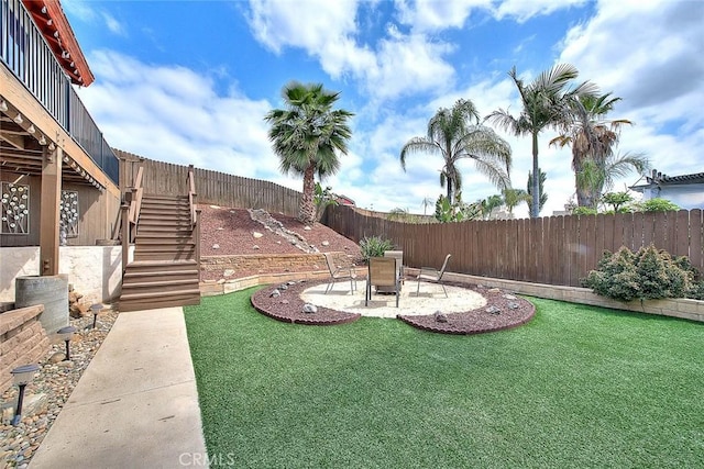 view of yard featuring stairs and a patio