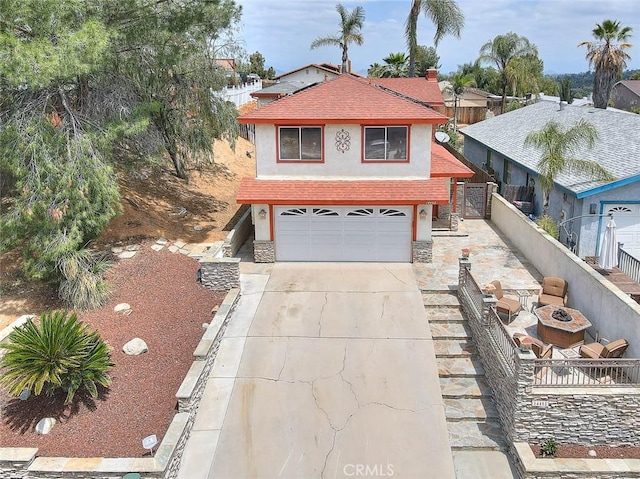 view of front of house with stucco siding, driveway, an attached garage, roof with shingles, and stone siding