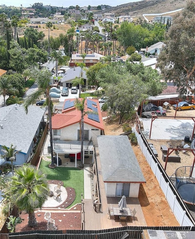 aerial view of property and surrounding area with mountains