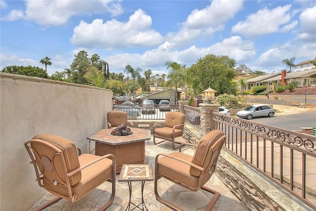 view of patio featuring a fire pit