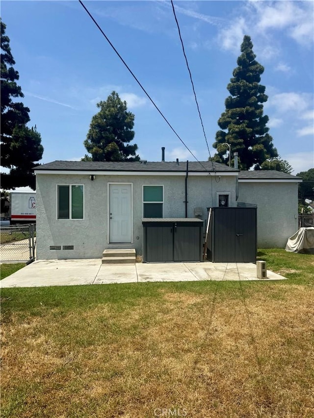 5046 Pacific Ave, Long Beach, CA 90805 - rear view of house featuring stucco siding, a patio, and entry steps