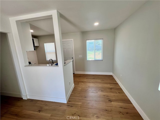 5046 Pacific Ave, Long Beach, CA 90805 - empty room featuring wood finished floors and baseboards