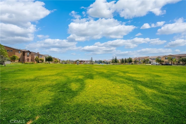 8713 Roving Pl, Chino, CA 91708 - view of grassy yard featuring a residential view