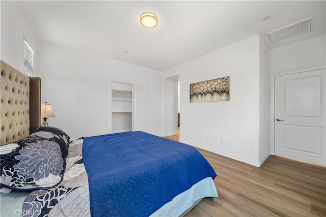 8713 Roving Pl, Chino, CA 91708 - bedroom with wood finished floors and baseboards
