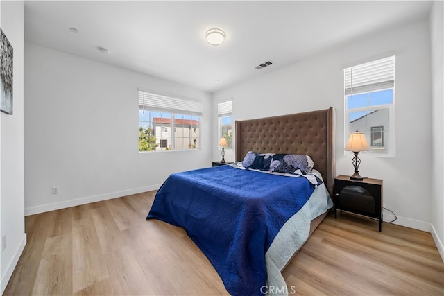 8713 Roving Pl, Chino, CA 91708 - bedroom featuring wood finished floors and baseboards