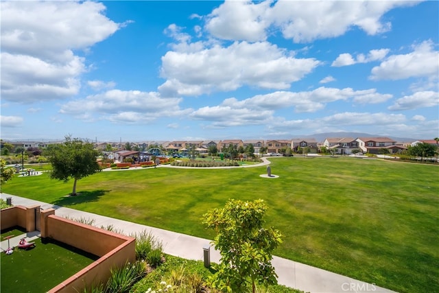 8713 Roving Pl, Chino, CA 91708 - surrounding community with a residential view and a yard