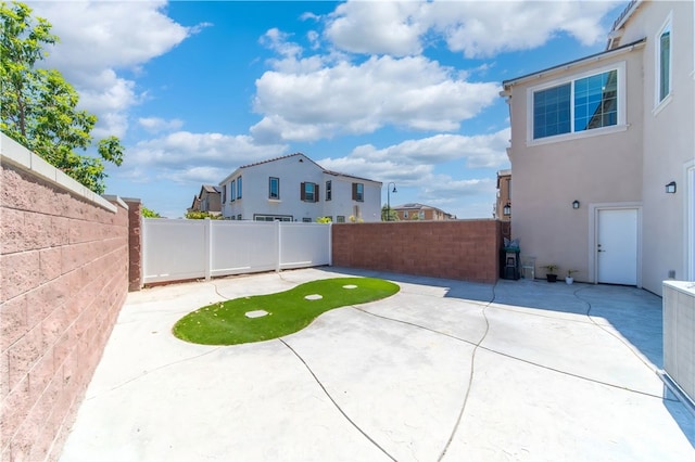 8713 Roving Pl, Chino, CA 91708 - fenced backyard featuring a patio area
