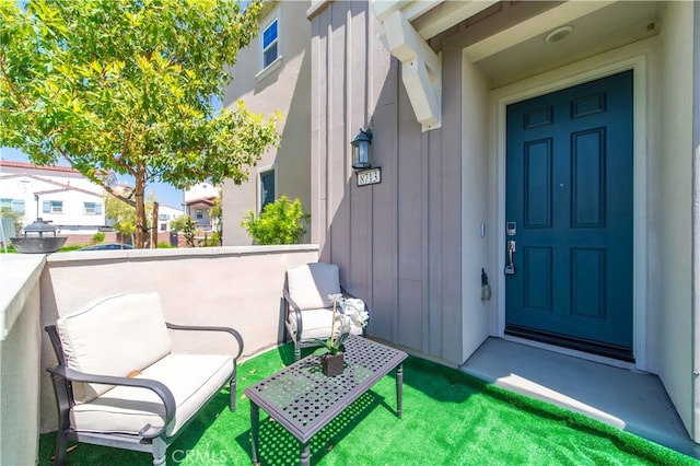 8713 Roving Pl, Chino, CA 91708 - view of exterior entry with board and batten siding
