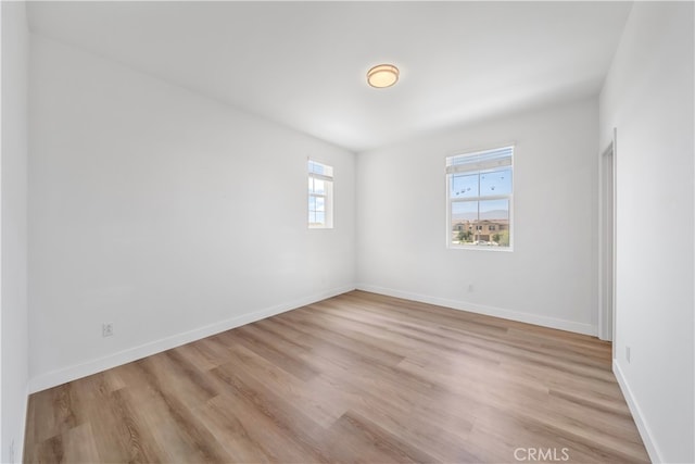 8713 Roving Pl, Chino, CA 91708 - unfurnished room with light wood-style flooring and baseboards