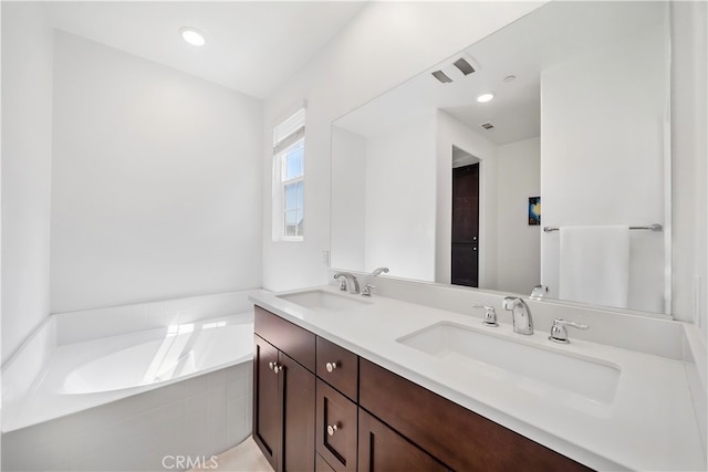 8713 Roving Pl, Chino, CA 91708 - bathroom with a bath and double vanity