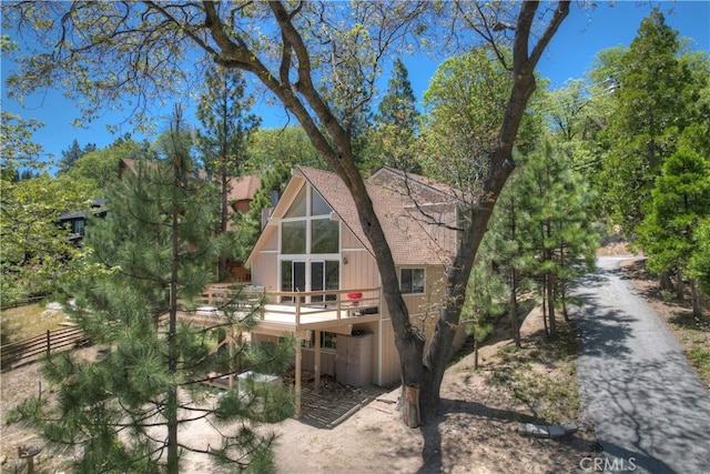 27559 N Bay, Lake Arrowhead, CA 92352 - back of house with a deck and a shingled roof