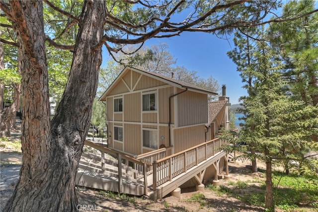 27559 N Bay, Lake Arrowhead, CA 92352 - back of property with a wooden deck and a chimney