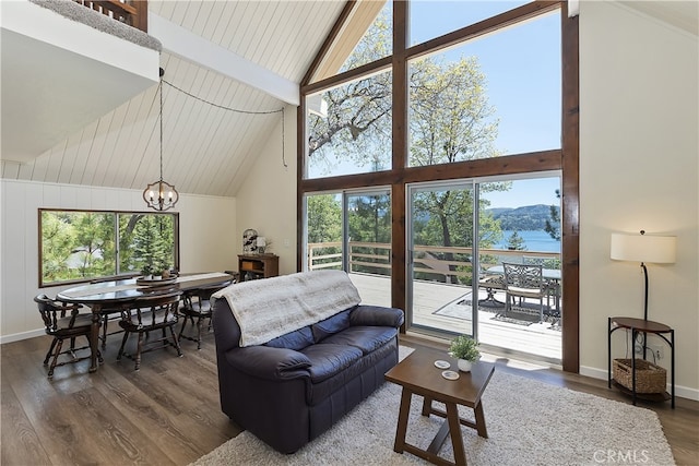 27559 N Bay, Lake Arrowhead, CA 92352 - living room featuring a chandelier, high vaulted ceiling, dark wood-type flooring, beam ceiling, and baseboards