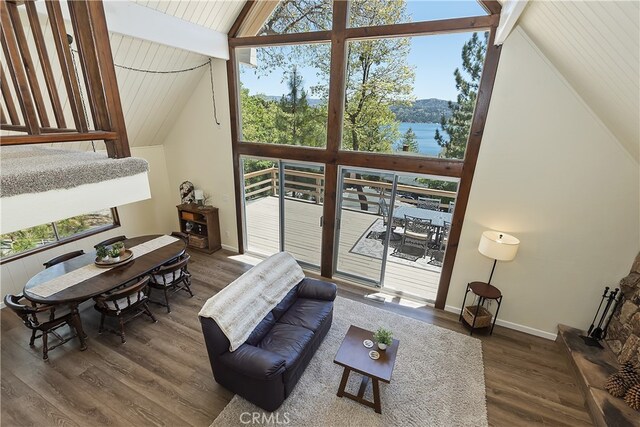 27559 N Bay, Lake Arrowhead, CA 92352 - living area featuring wood finished floors, baseboards, a water view, high vaulted ceiling, and wood ceiling with exposed beams