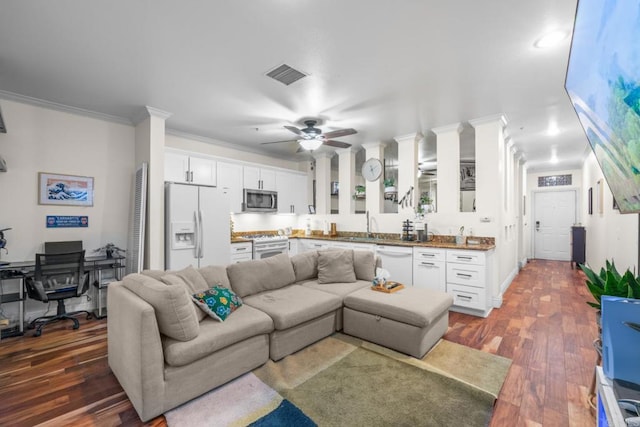 1465 C St Unit 3416, San Diego, CA 92101 - living room with crown molding, ceiling fan, dark wood-type flooring, and a desk
