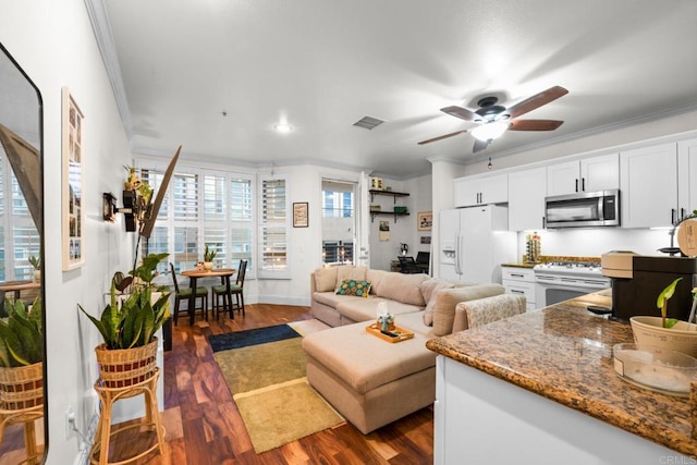 1465 C St Unit 3416, San Diego, CA 92101 - living room with ornamental molding, a ceiling fan, dark wood-style flooring, and baseboards