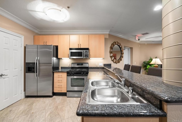 1465 C St Unit 3416, San Diego, CA 92101 - kitchen with appliances with stainless steel finishes, crown molding, a sink, light brown cabinetry, and a peninsula