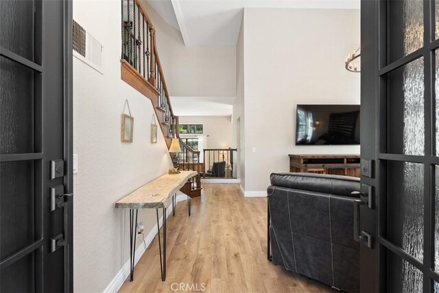 25311 Darlington, Mission Viejo, CA 92692 - foyer entrance featuring stairs, light wood-style flooring, and baseboards
