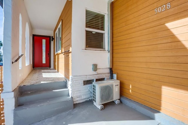 5028 Monroe Ave, San Diego, CA 92115 - doorway to property featuring ac unit and stucco siding