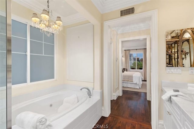 3 Blue Spruce Dr, Ladera Ranch, CA 92694 - full bath featuring vanity, a jetted tub, a chandelier, crown molding, and wood finished floors