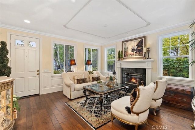 3 Blue Spruce Dr, Ladera Ranch, CA 92694 - living room with a high end fireplace, dark wood-style flooring, crown molding, healthy amount of natural light, and recessed lighting