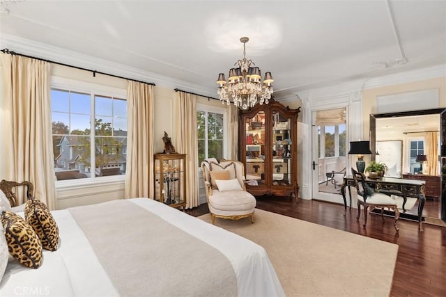 3 Blue Spruce Dr, Ladera Ranch, CA 92694 - bedroom featuring a chandelier, dark wood-style flooring, and crown molding
