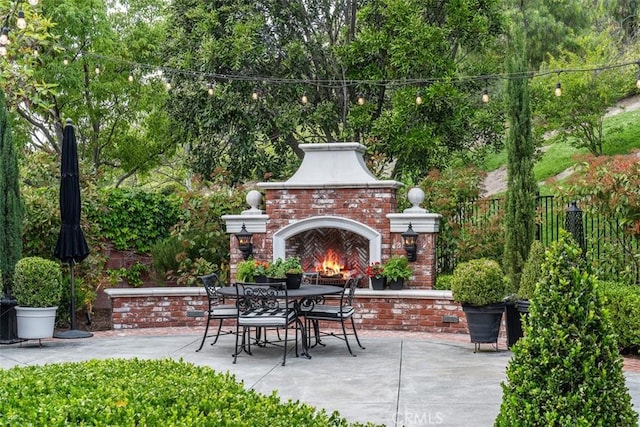3 Blue Spruce Dr, Ladera Ranch, CA 92694 - view of patio / terrace featuring an outdoor brick fireplace