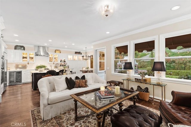 3 Blue Spruce Dr, Ladera Ranch, CA 92694 - living room featuring wine cooler, wood finished floors, ornamental molding, and recessed lighting