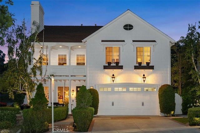 3 Blue Spruce Dr, Ladera Ranch, CA 92694 - view of front of property featuring a chimney, driveway, a garage, and a balcony