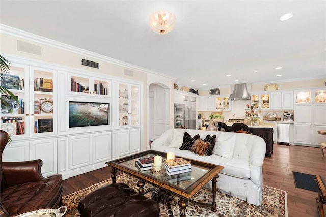 3 Blue Spruce Dr, Ladera Ranch, CA 92694 - living room with dark wood-style floors, ornamental molding, and recessed lighting