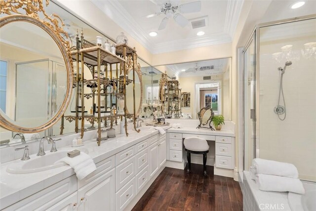 3 Blue Spruce Dr, Ladera Ranch, CA 92694 - bathroom featuring double vanity, wood-type flooring, tiled shower, ornamental molding, and a ceiling fan