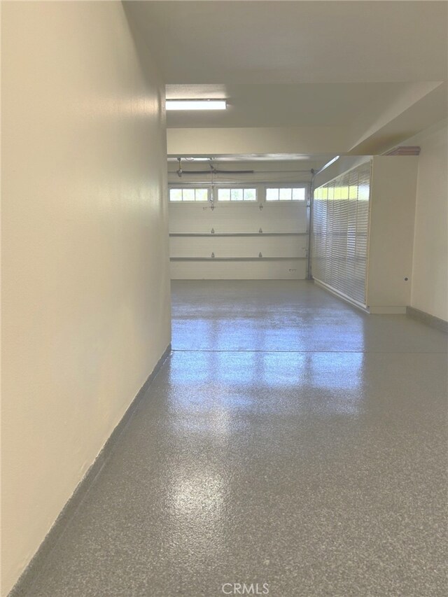 3 Blue Spruce Dr, Ladera Ranch, CA 92694 - garage featuring baseboards